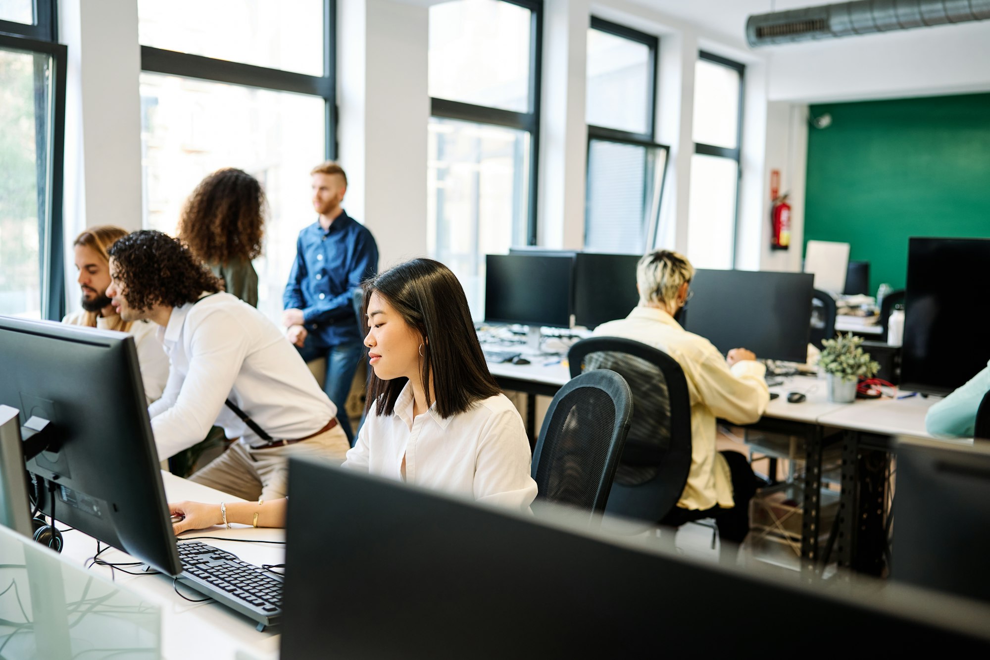 Coworking space with multi-ethnic young people working